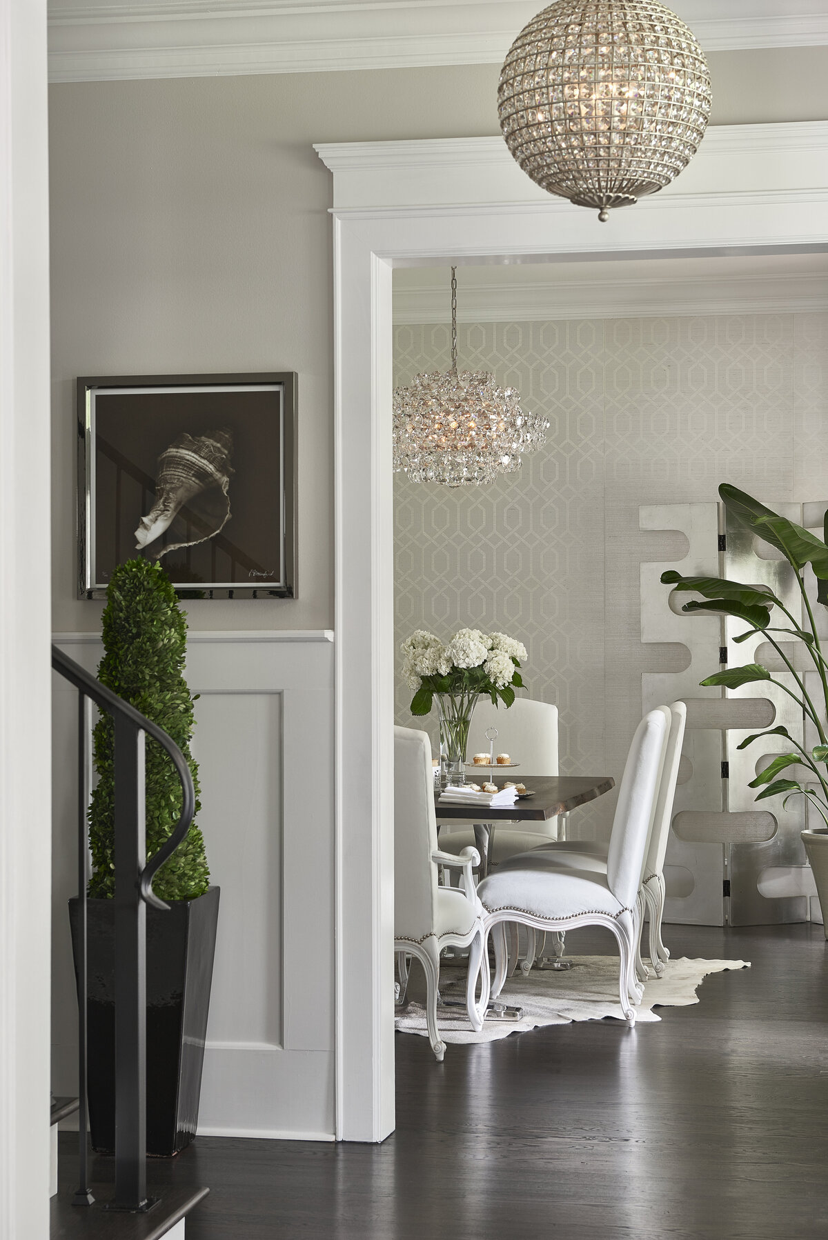 White Comfy dining Chairs with Drop Chandelier
