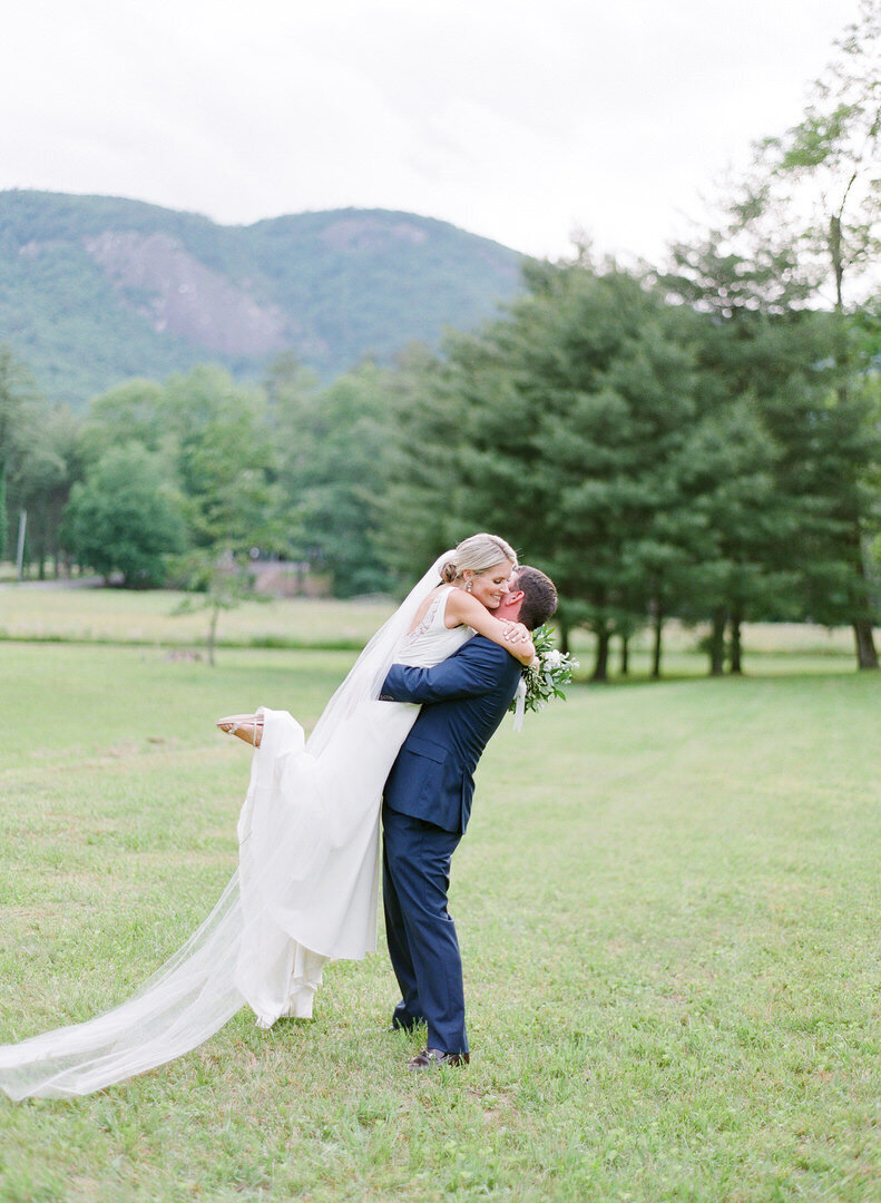 Bride and Groom Hugging Photo