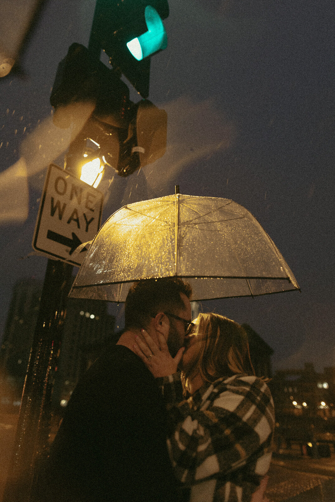 couples-rain-playful-night-session-downtown-moody-umbrella-film-illinois-10