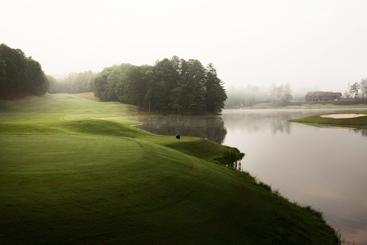 Looking at Sconti clubhouse over the pond at Big Canoe