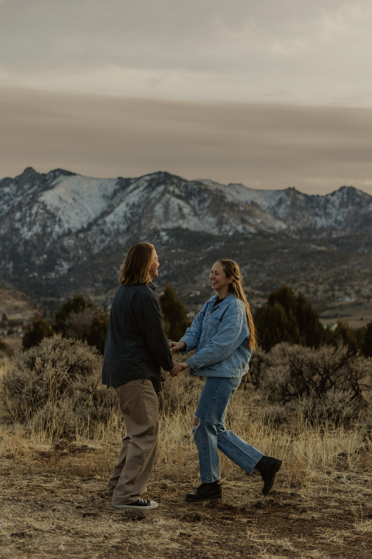 Couple Running With a mountain view in Southern Idaho 
