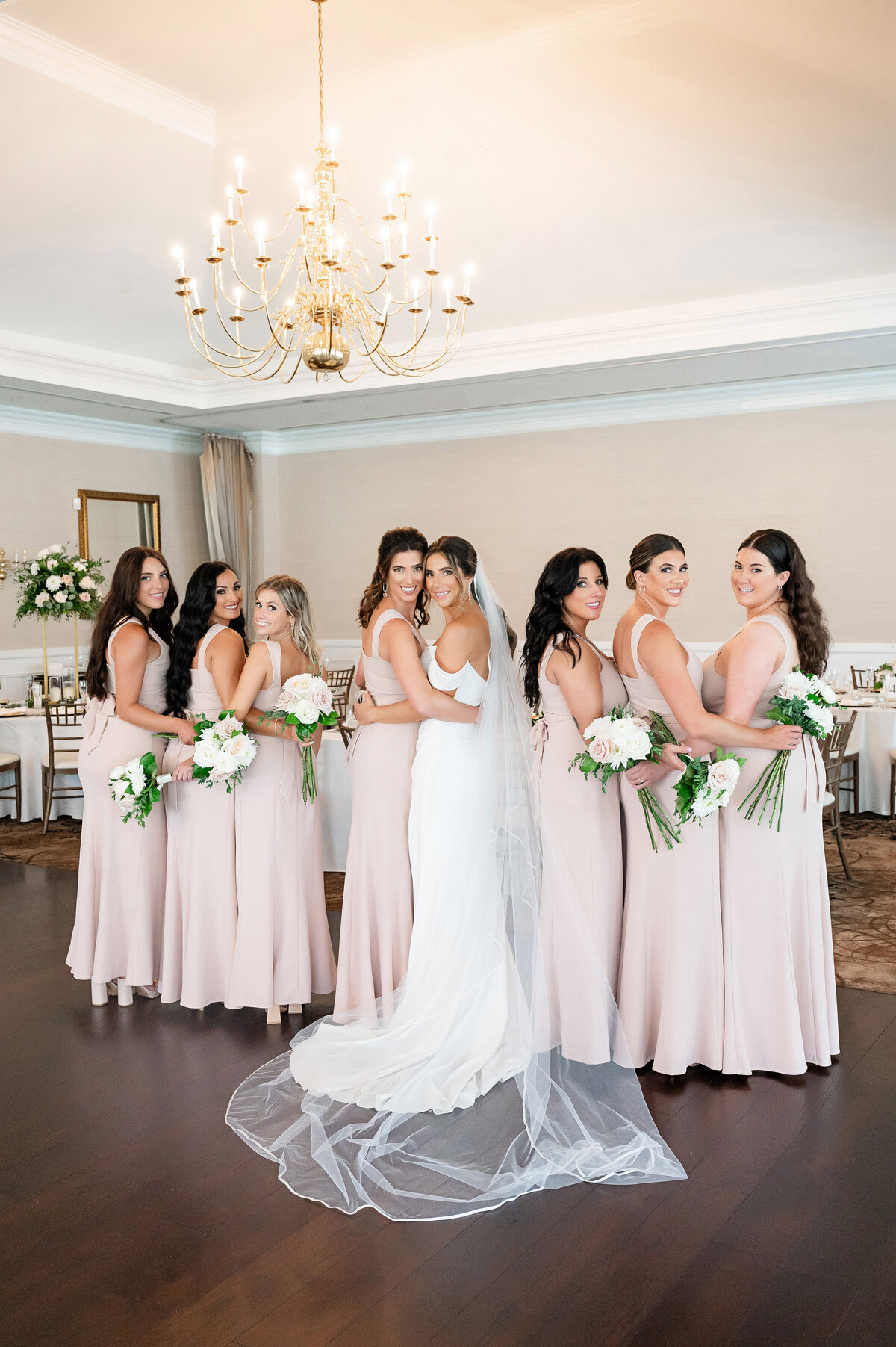 bride and bridesmaids in ballroom of southpointe golf club pittsburgh