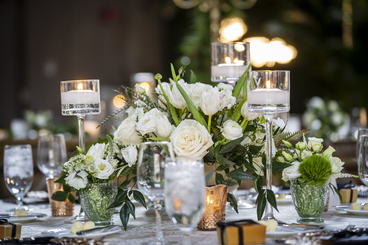 Table setting with bouquet in the center.