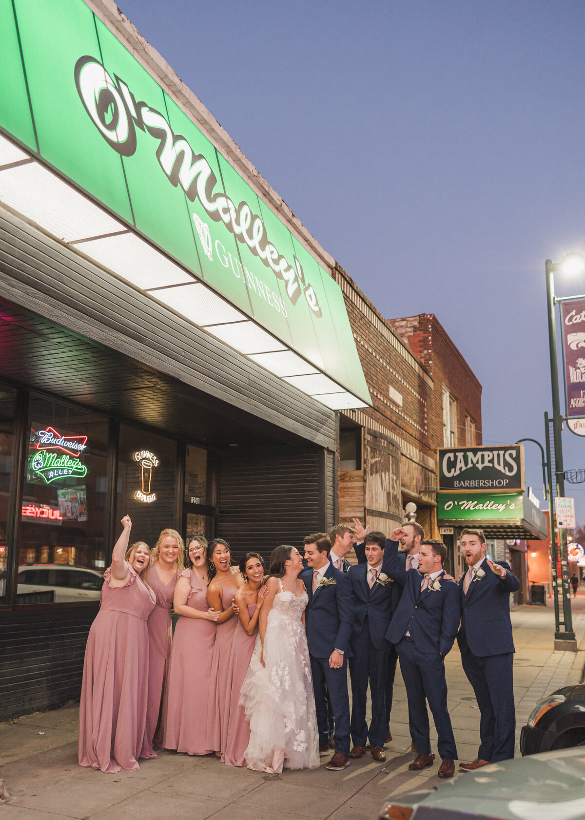 Mahattan, Kansas. Aggieville Bar Photo. Cheers. Bridal Party Photo. Kansas Wedding Photography