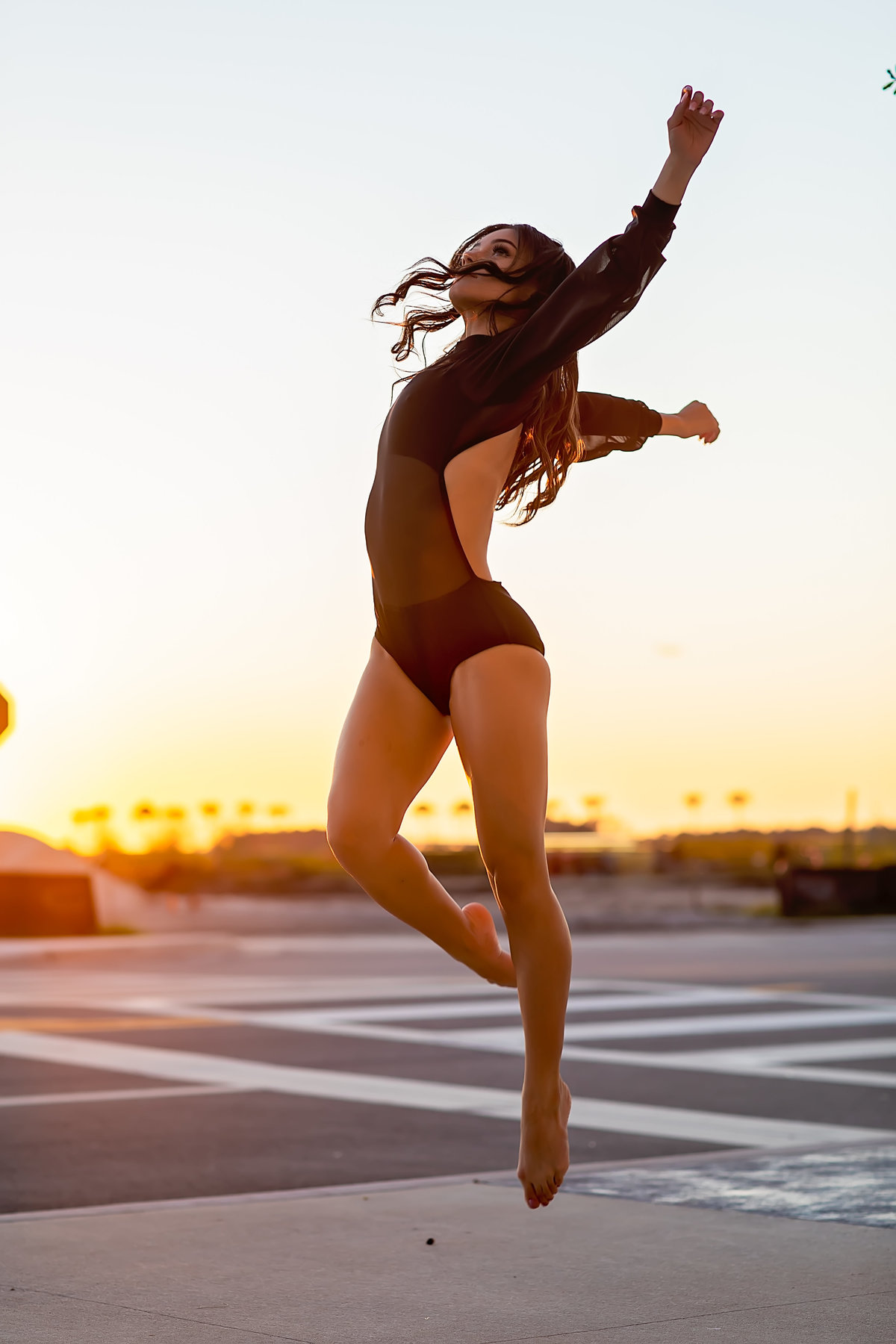 dancer jump at sunset shot by collette mruk