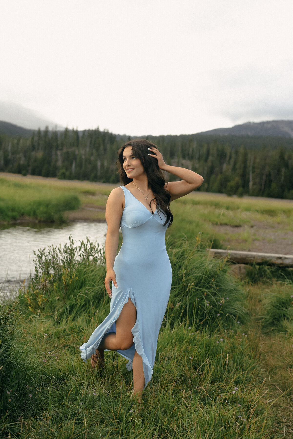 Black and White Graduation Photo of Two Friends Walking Through the Park