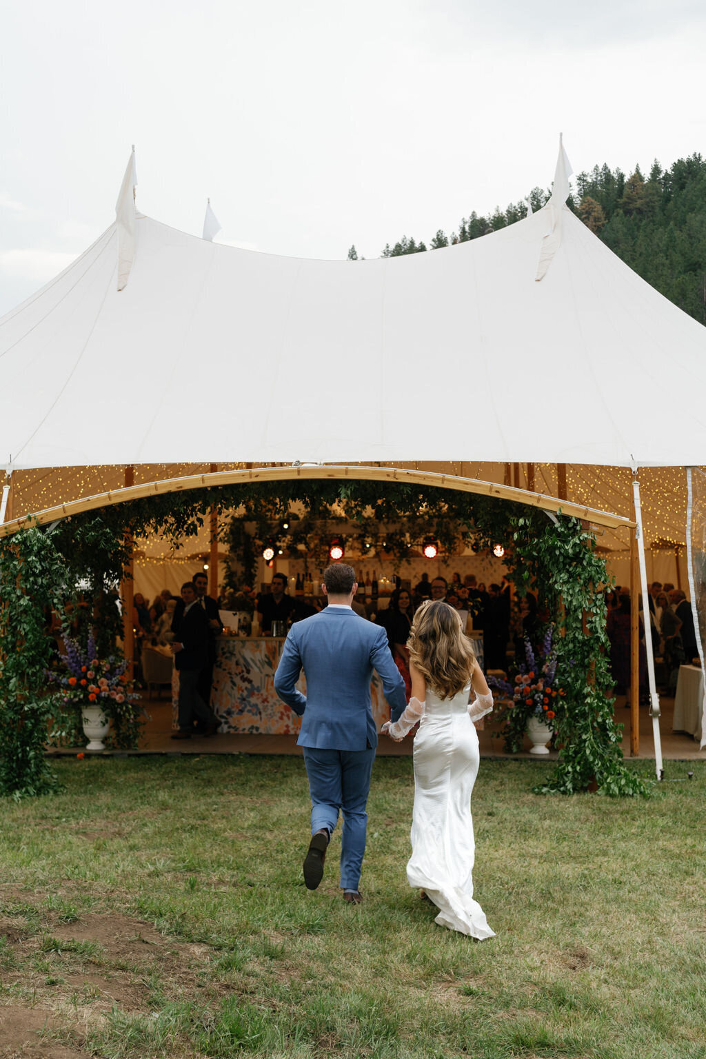 Colorado-wedding-planner-bride-groom-tent-entry