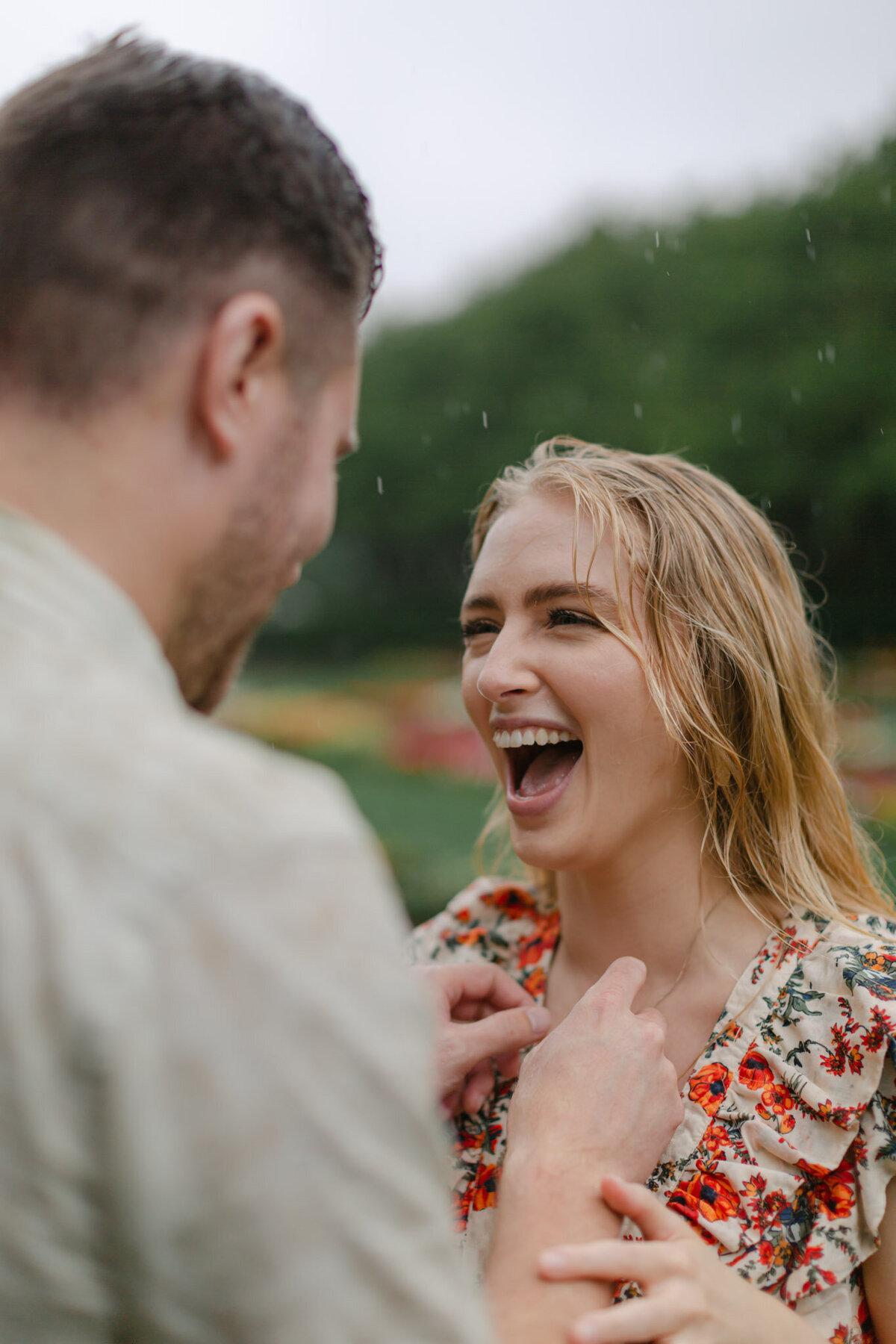laughing couple during engagement photoshoot