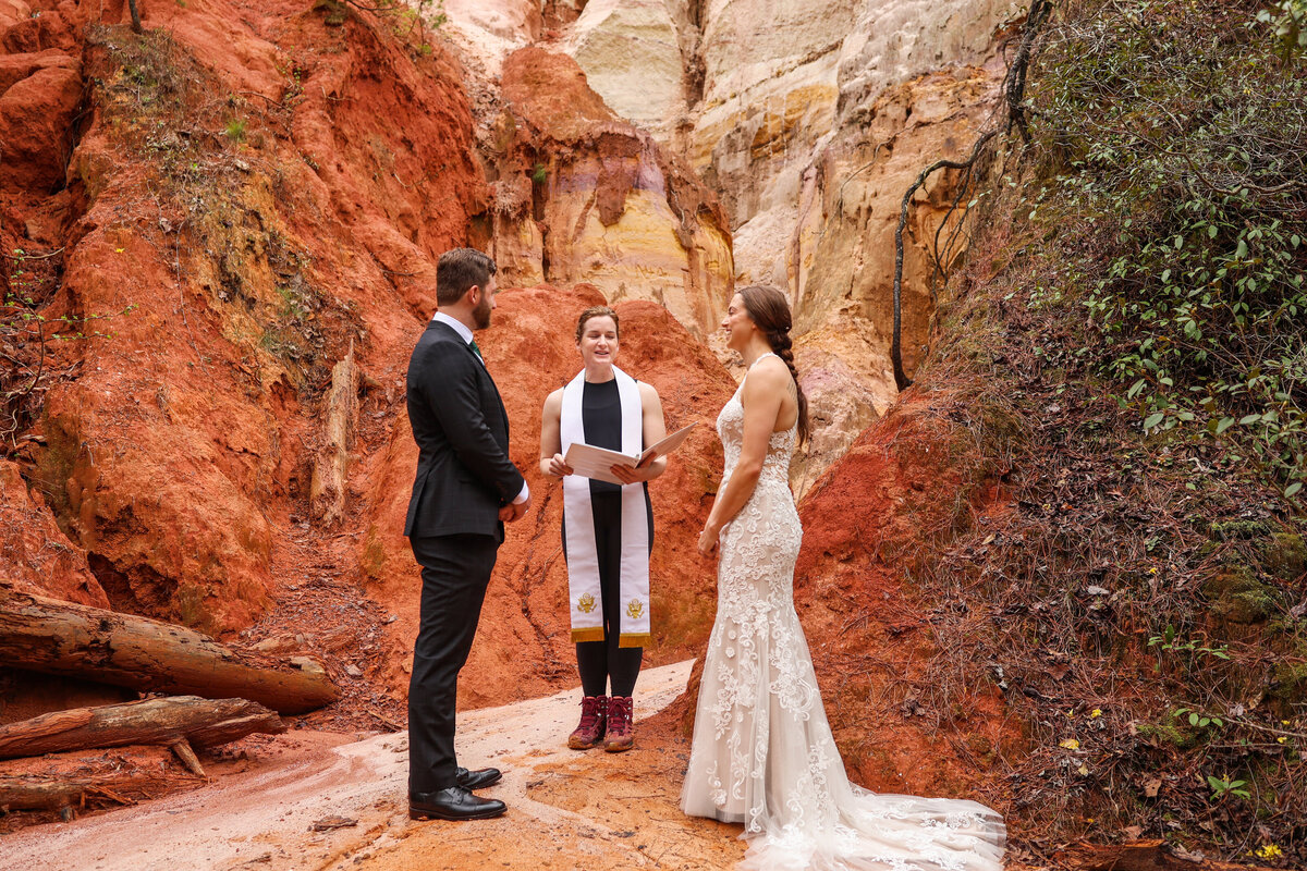 Bride and Groom Reciting Vows at Providence Canyon State Park in Lumpkin Georgia. 