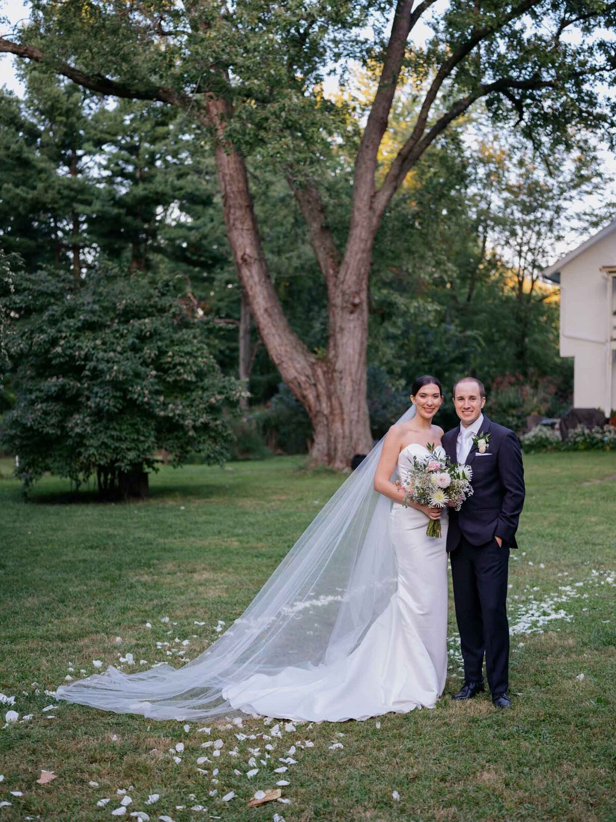 Classic bride and groom portrait at their private residence tented wedding.