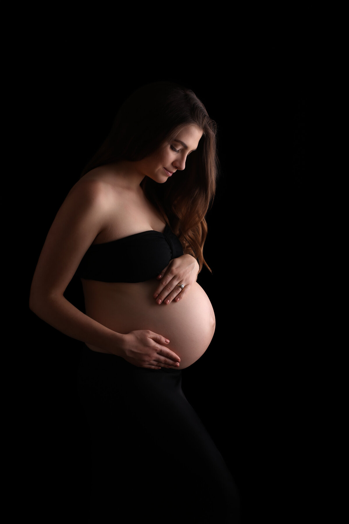 Maternity image with black background
