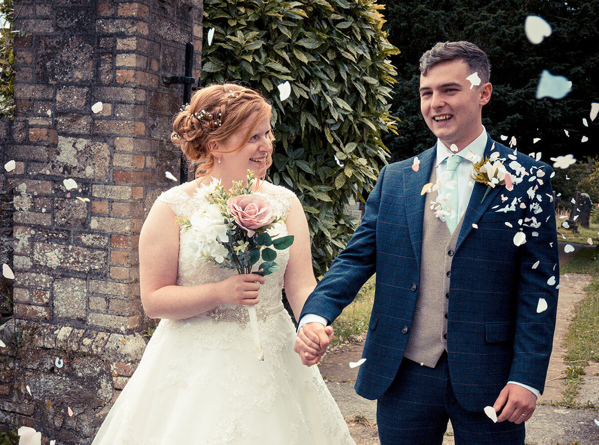 bride & groom with confetti.crop.1