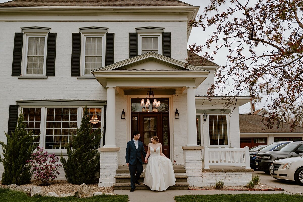 wedding-couple-front-porch-sister-hill-manchester-iowa-storyteller-collective-photo-co