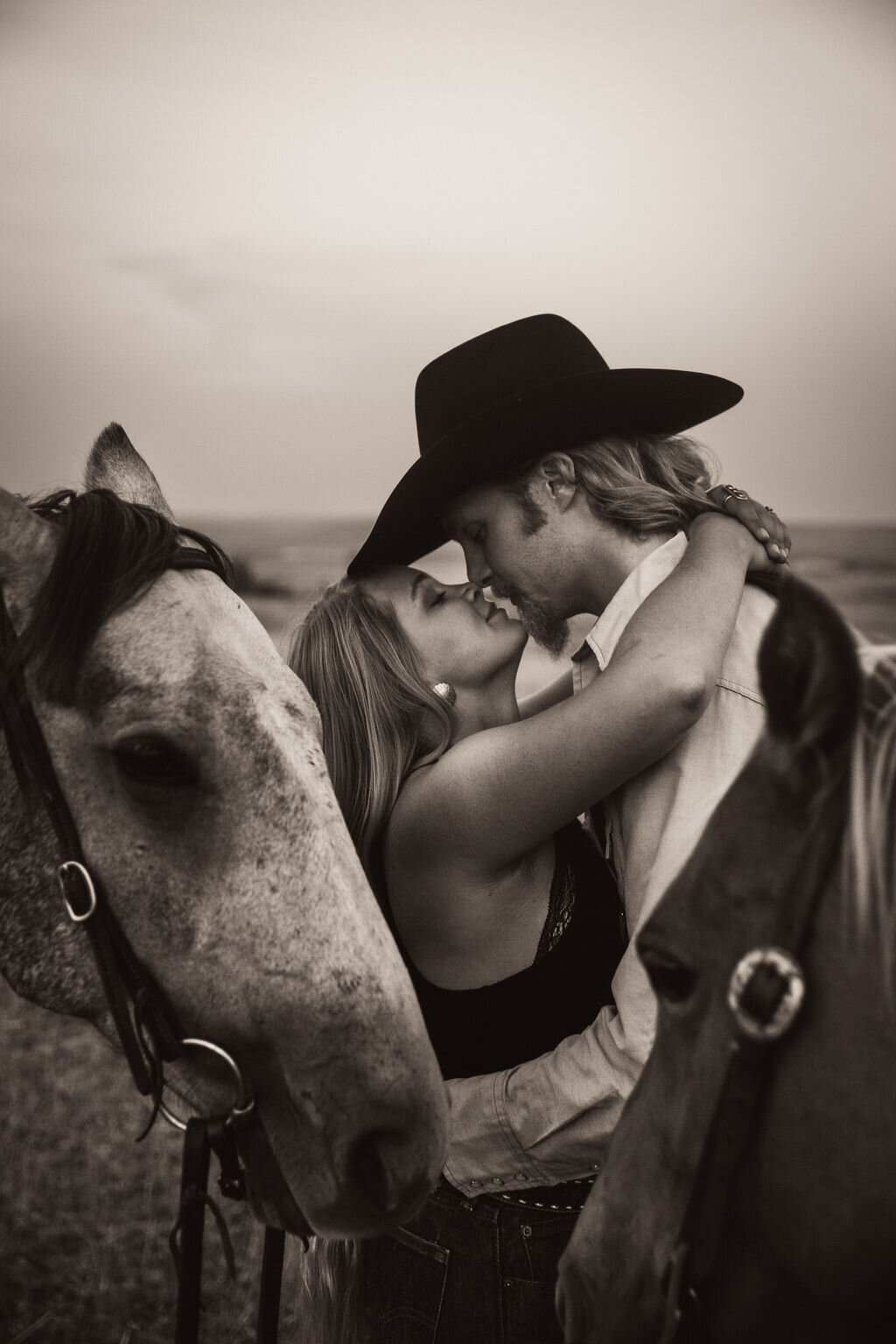 Photograph of couple with a horse