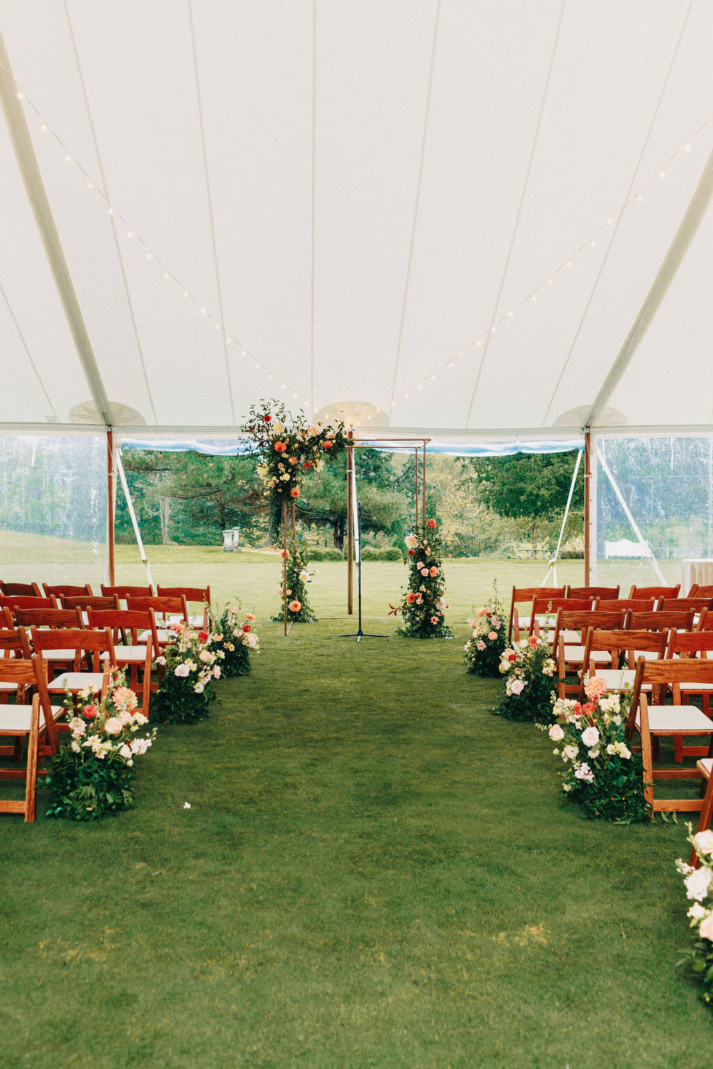 tented-ceremony-summer-floral-decor