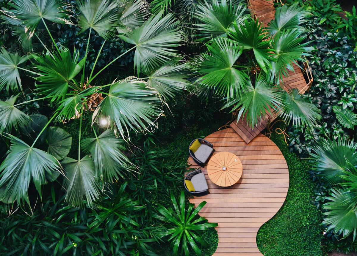 Tropical Area with wooden tables