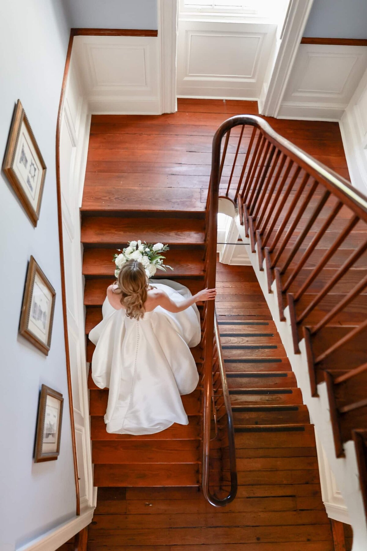 Bride walking up steps