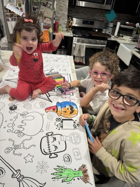 3 kids smiling coloring halloween banner
