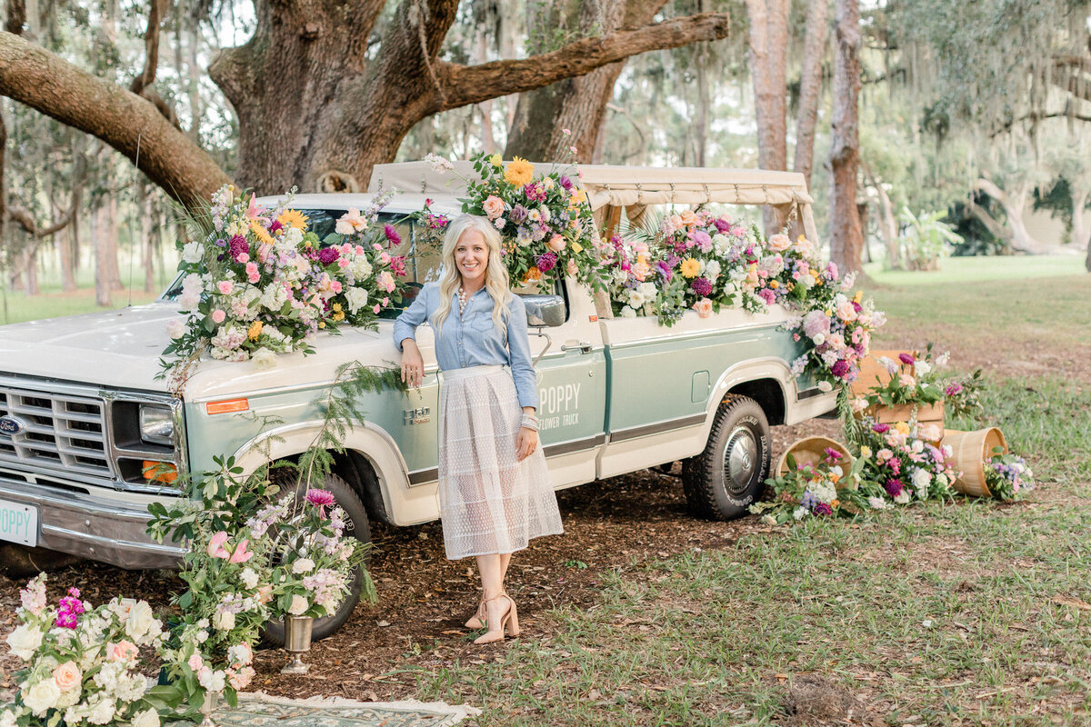 florist with truck and florals by Orlando headshot photographer