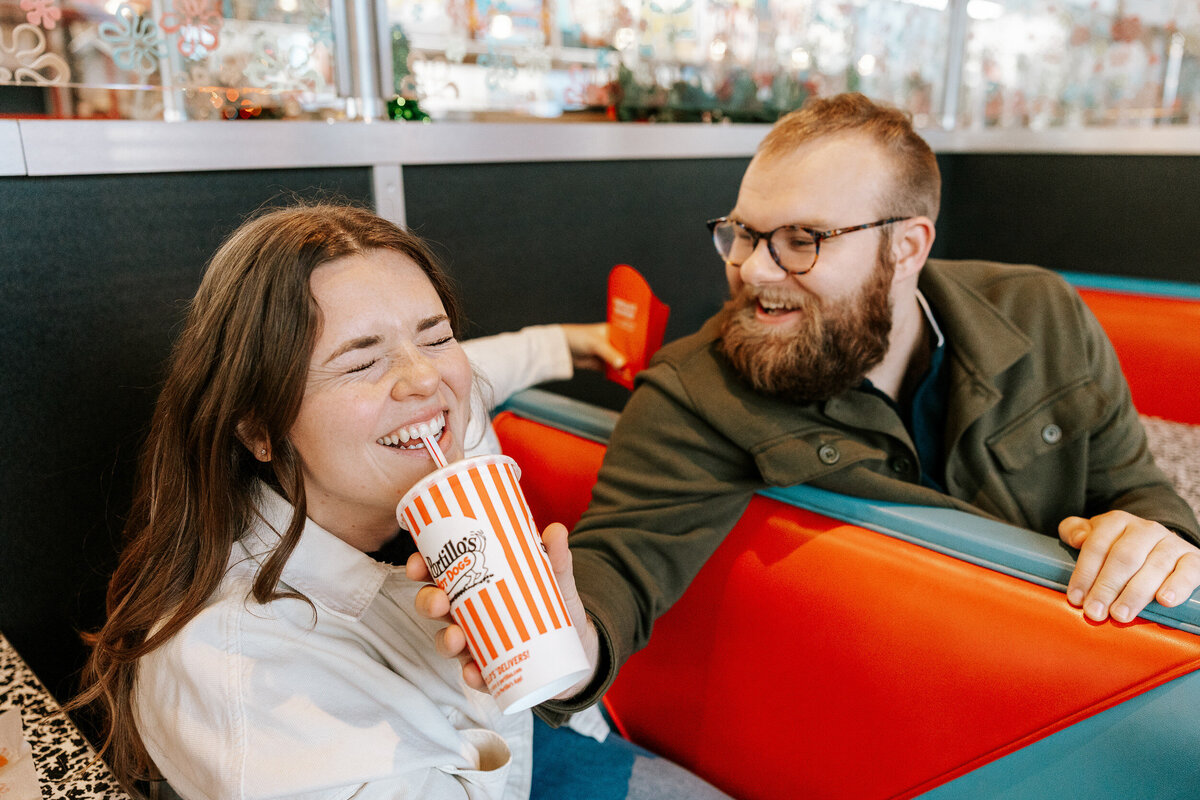 creative fun chicago flash engagement photos at Portillos Hotdogs-35-ed-lucy