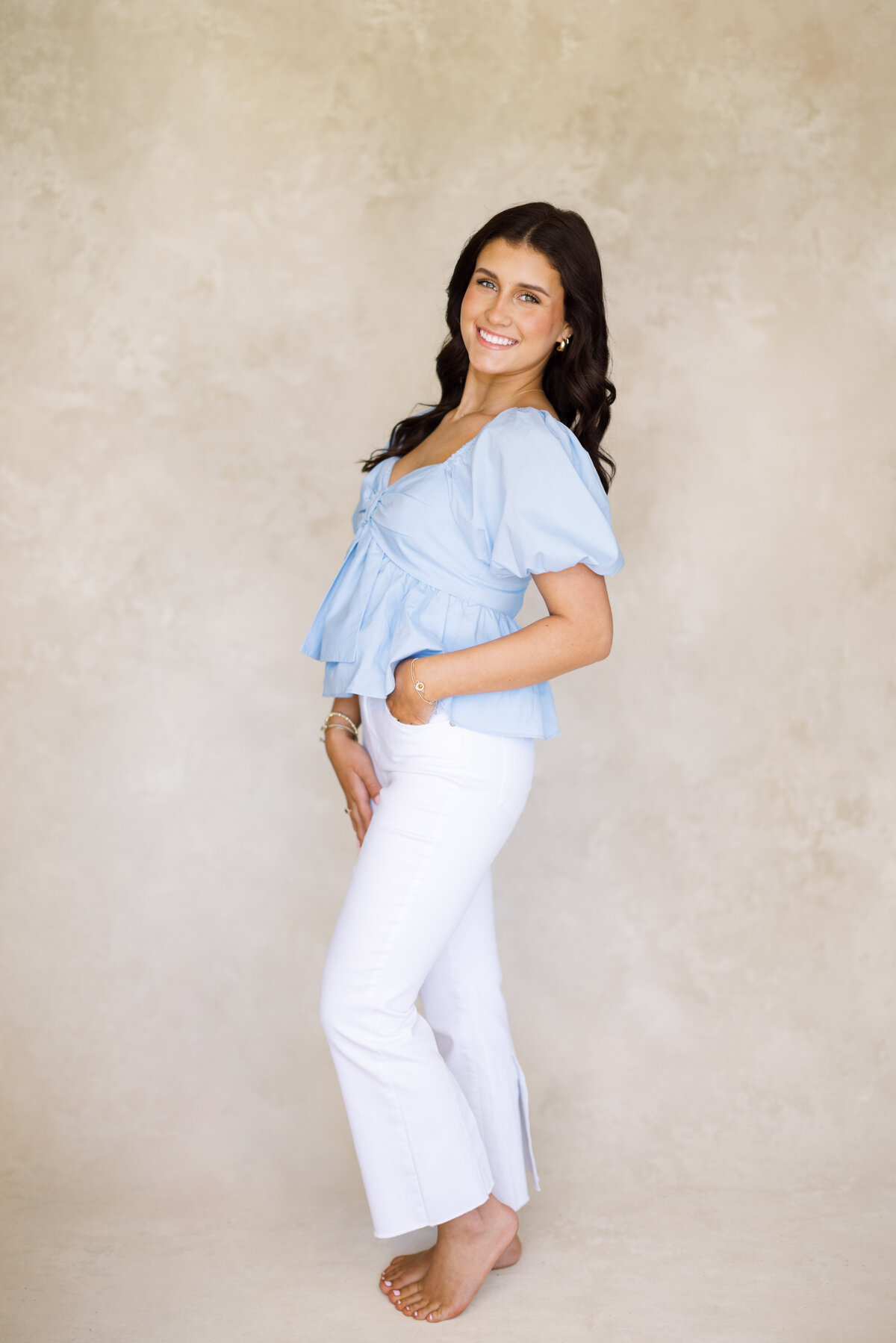 A refined studio senior session capturing timeless beauty and personality in a controlled setting, artfully documented on film by Morgan Alysse, Louisiana film photographer.