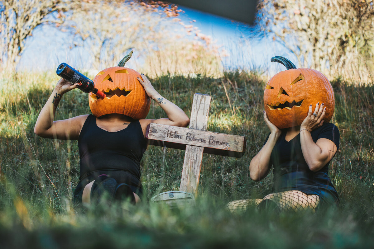 Best friends wear pumpkin heads in the Fall of New York photography