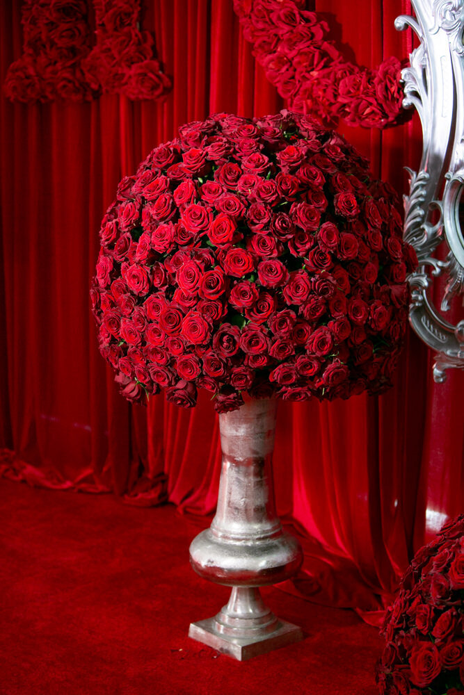 A large arrangement of red roses