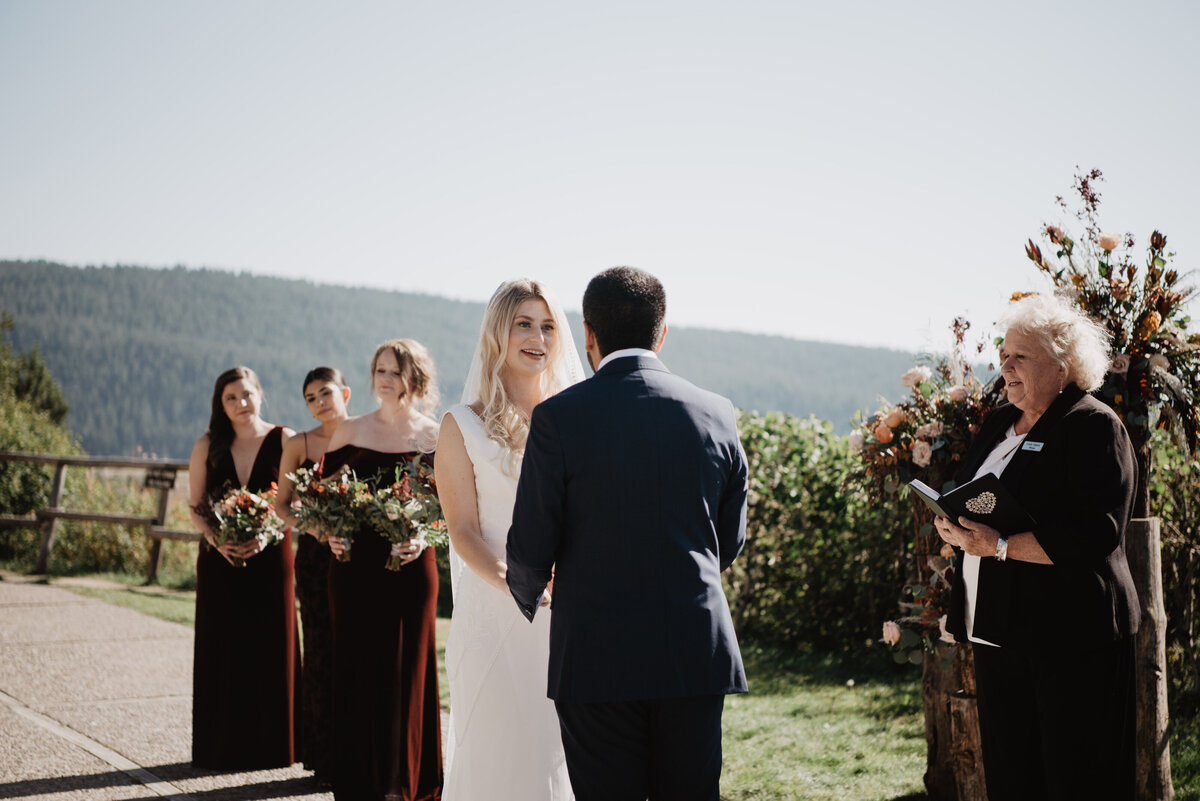 Photographers Jackson Hole capture bride reading vows to groom