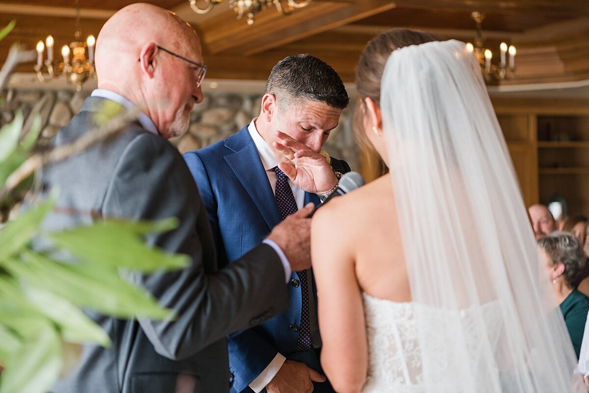 groom crying during Boise Idaho wedding ceremony