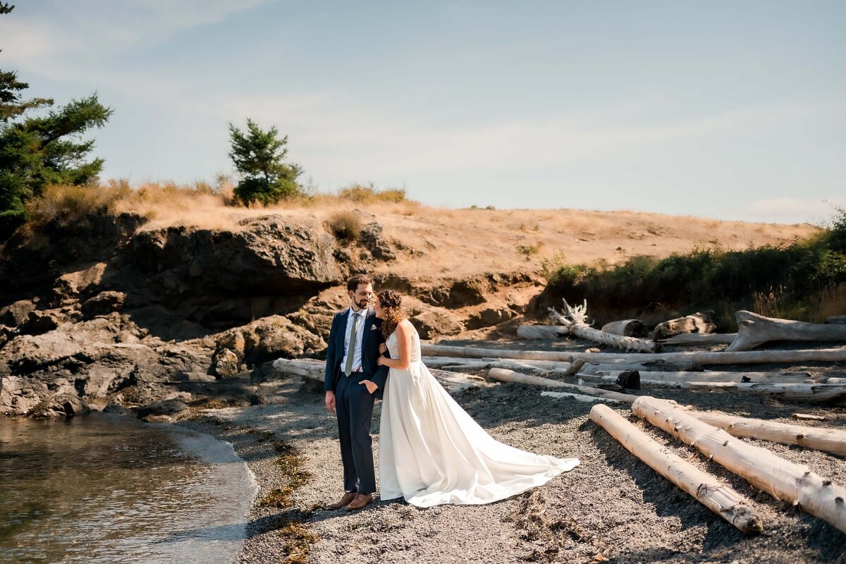 bride and groom on the rocky coast on Vashon Island