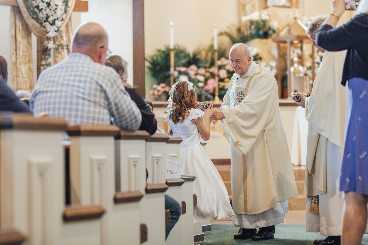 First Communion Photographer | Child receiving First Communion at St. Elizabeth Ann Seton Church | Hunterdon County, New Jersey