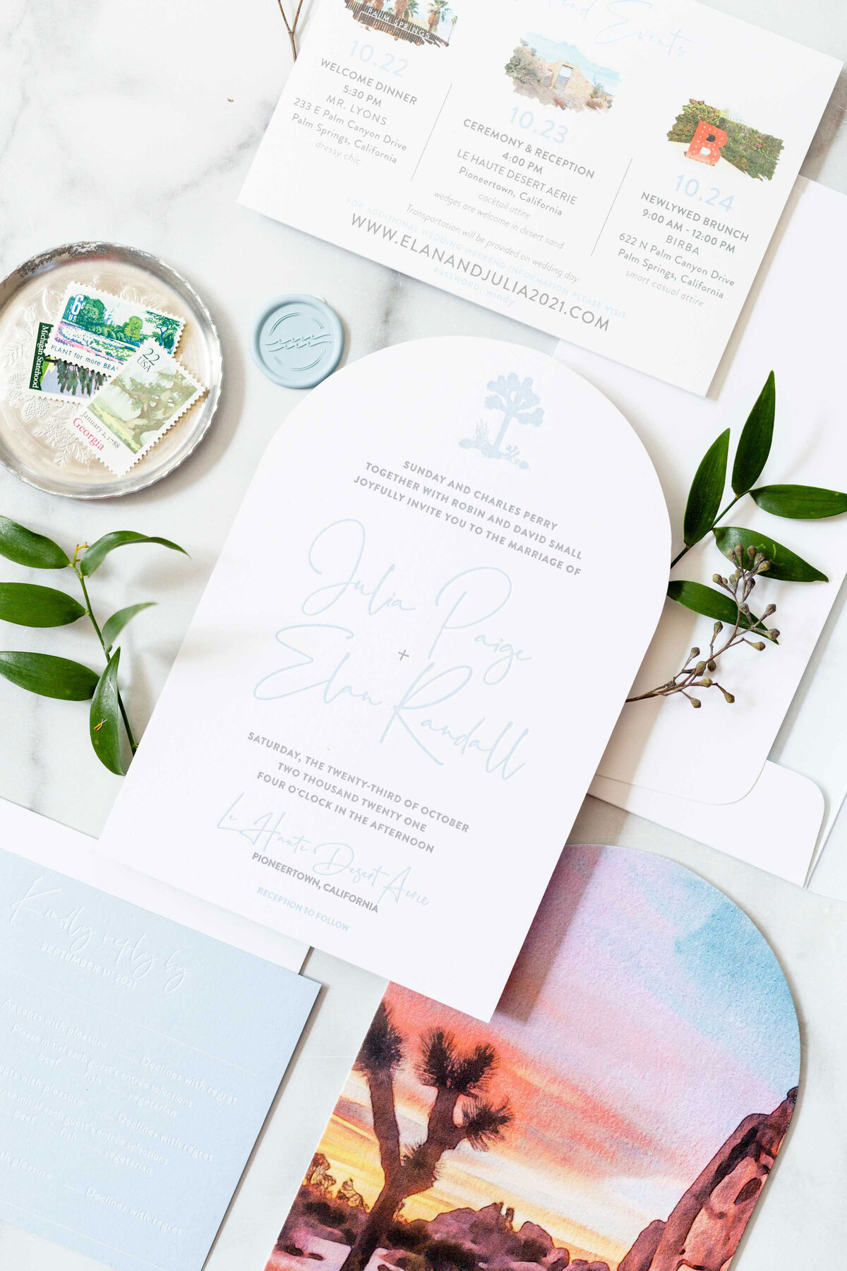 Joshua Tree wedding invitation. Arched top invitation printed in light blue and grey letterpress with image of Joshua tree on back side