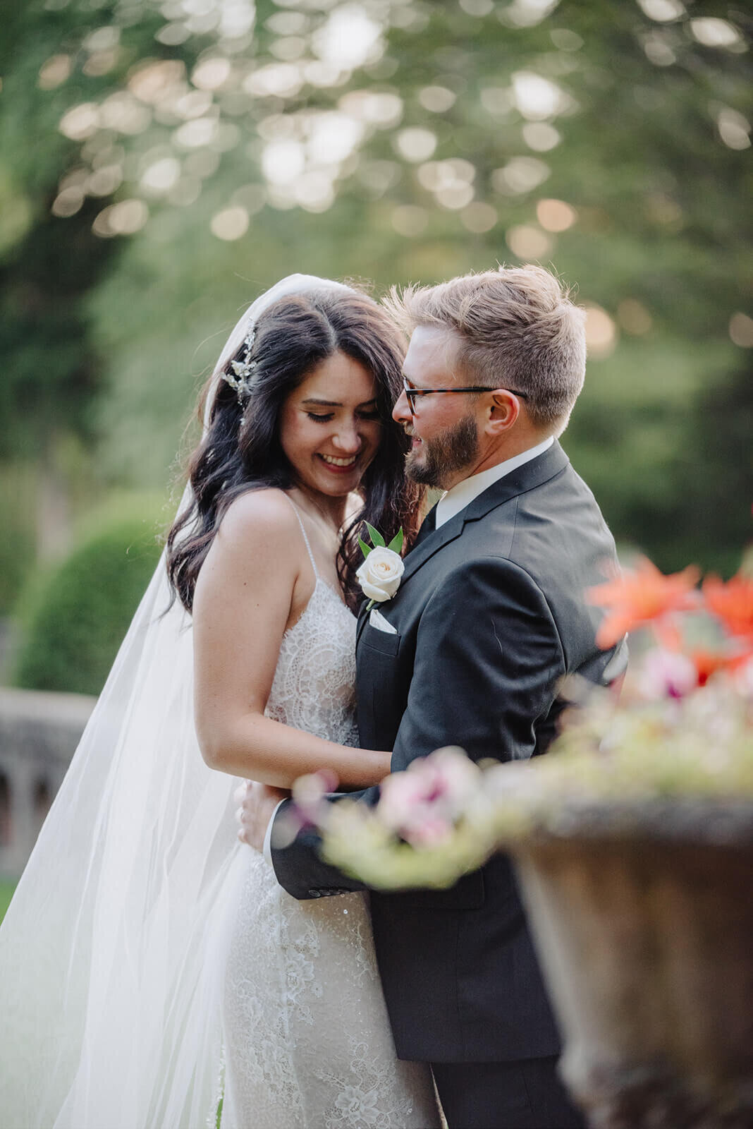 Bride and groom in embrace at Finger Lakes wedding, NY