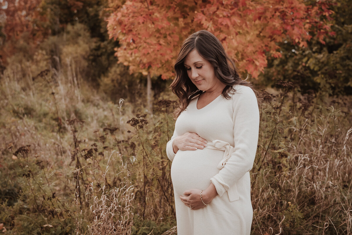 Mom holding baby bump