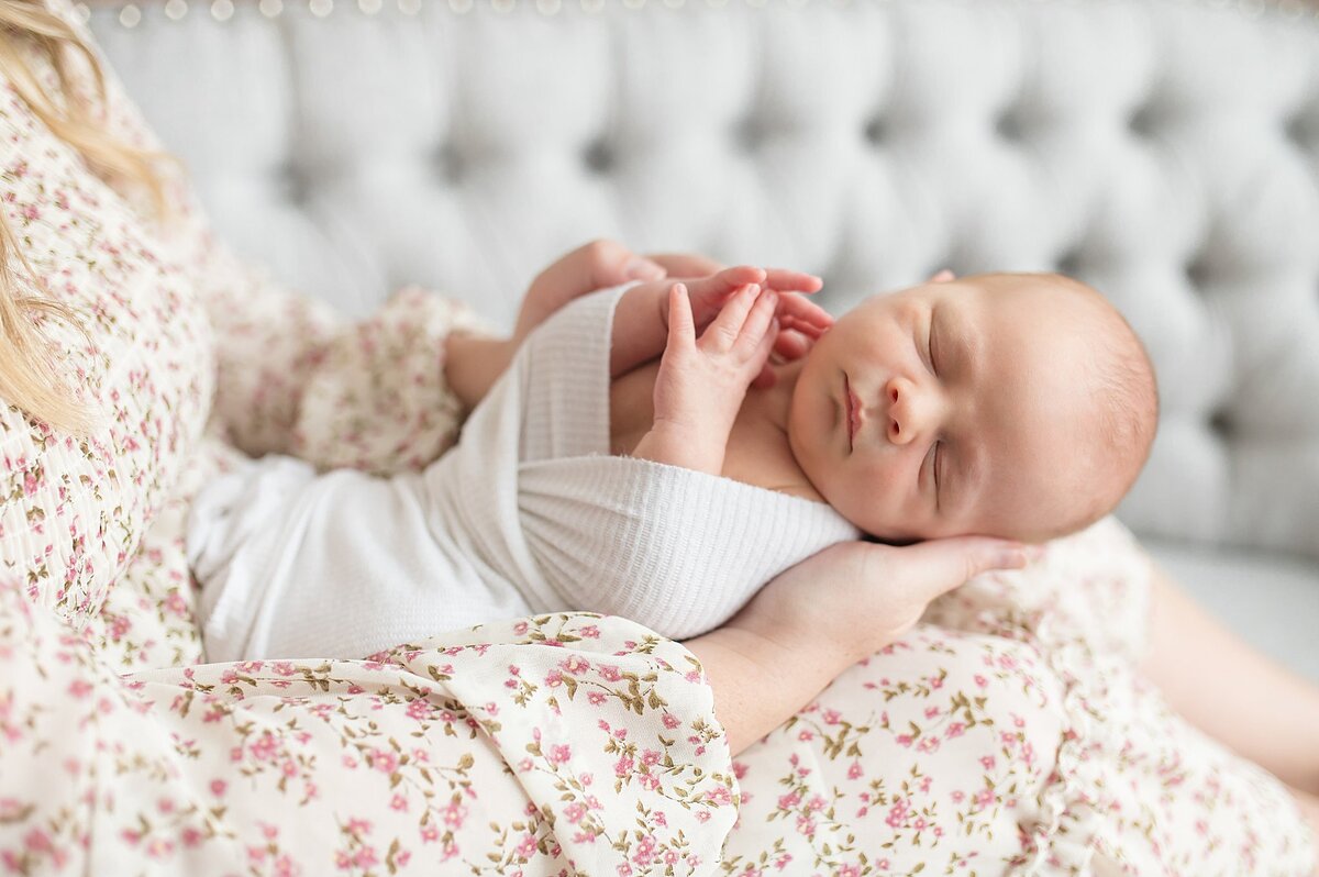 Mama holding baby in Frisco Newborn Photography session