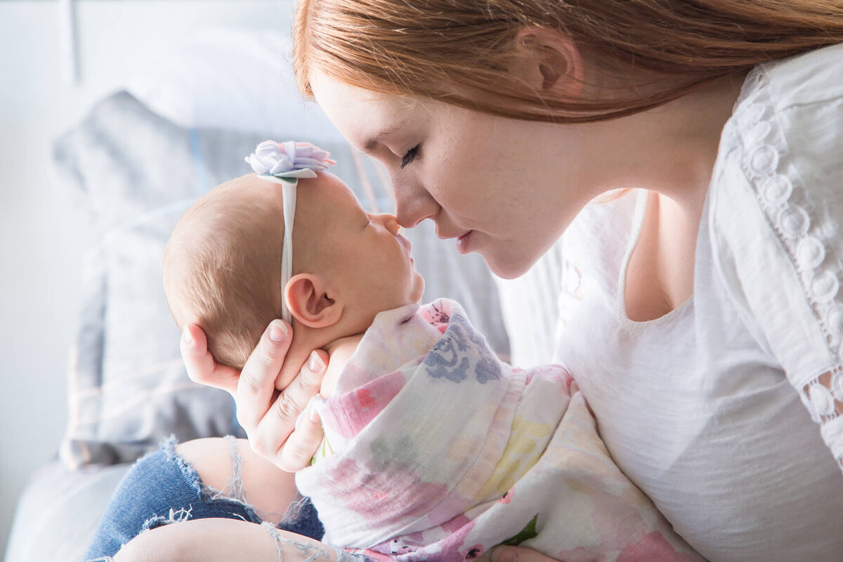 New mother lovingly nose to nose with her newborn baby girl, Las vegas newborn photography by Jessica Bowles