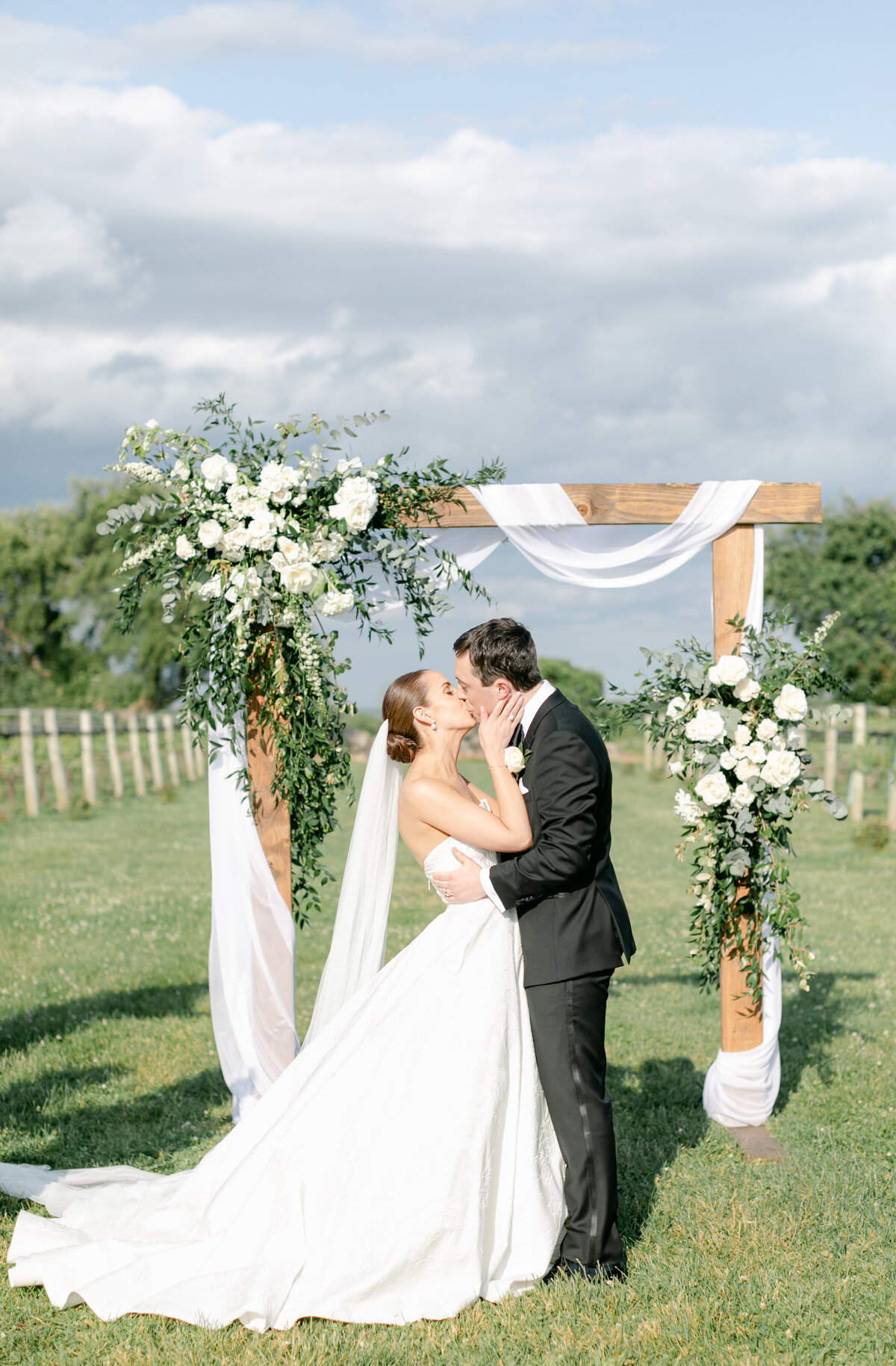 married-kiss-at-wedding-ceremony