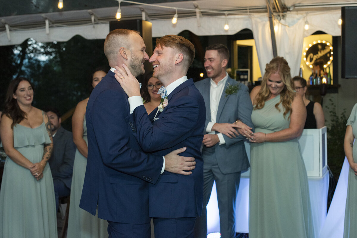 Gay couple dancing at Twisty Maple wedding