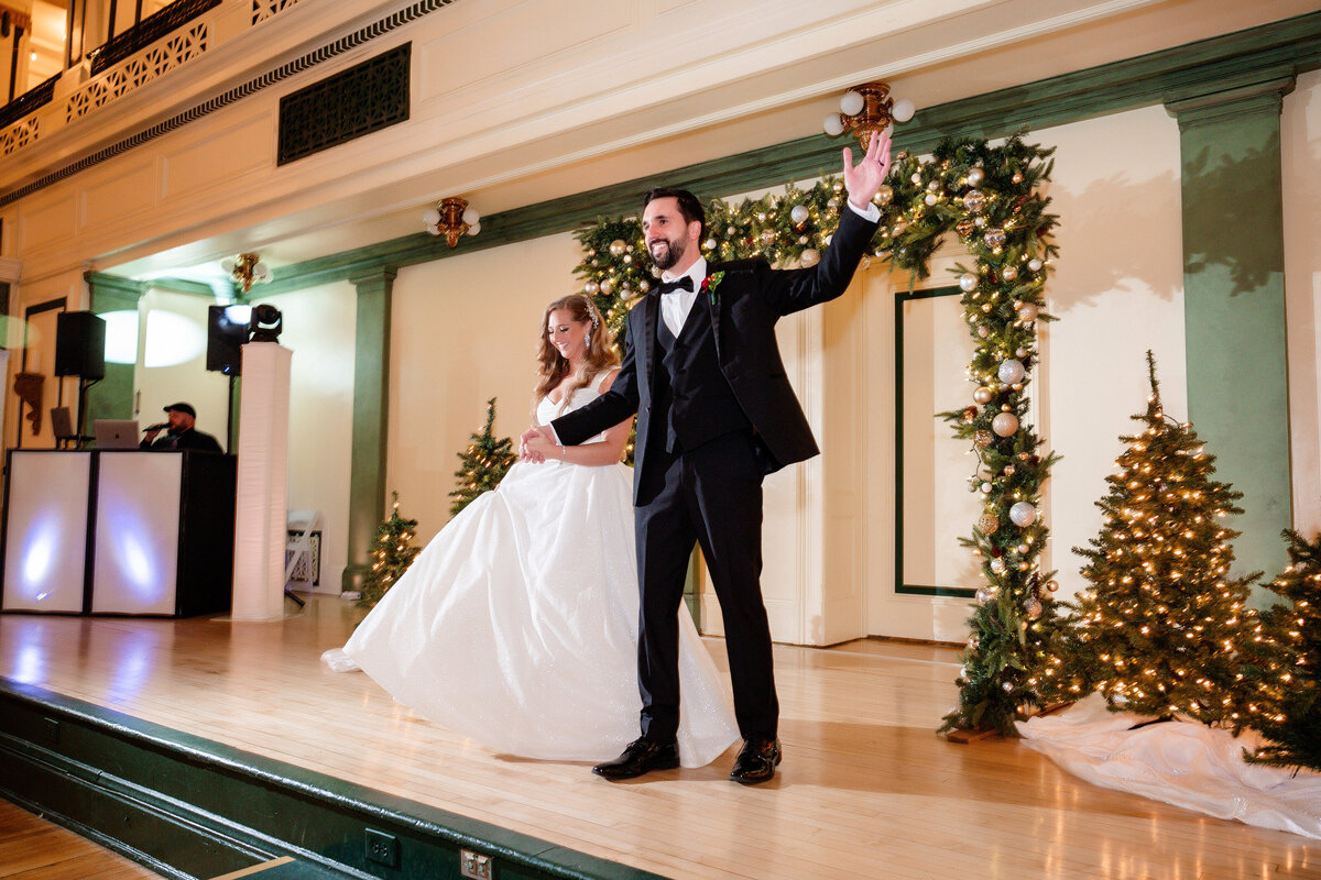 married couple being introduced into wedding receptionat soldiers and sailors