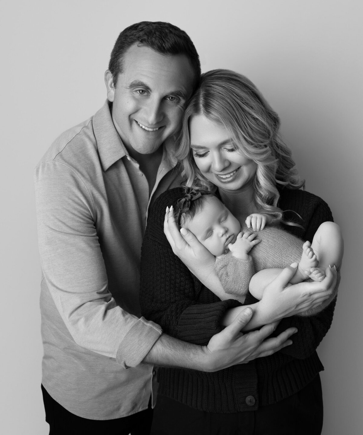 Black white family portrait with newborn Austin professional photographer