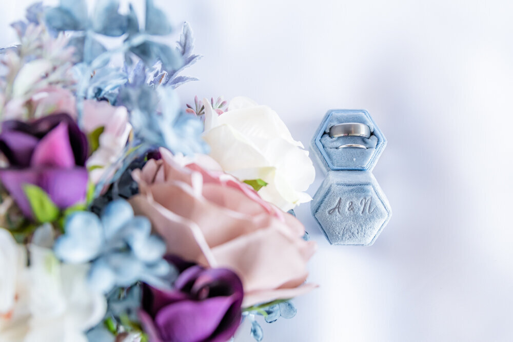 detail shot of cairns bride bouquet and wedding rings Townsville Wedding Photography by Jamie Simmons