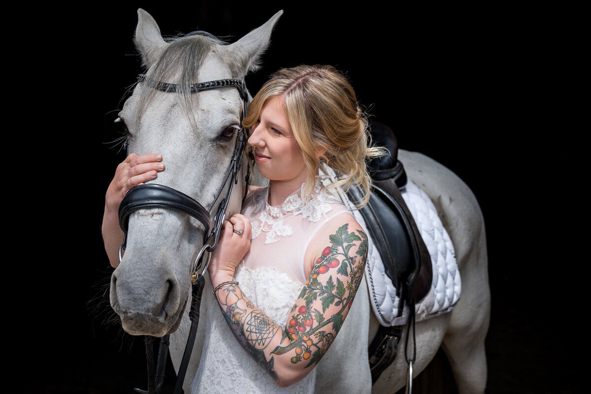 Beautifully captured moments of a bride and her horse on an Arcata ranch, blending natural grace with the charm of a country wedding backdrop.