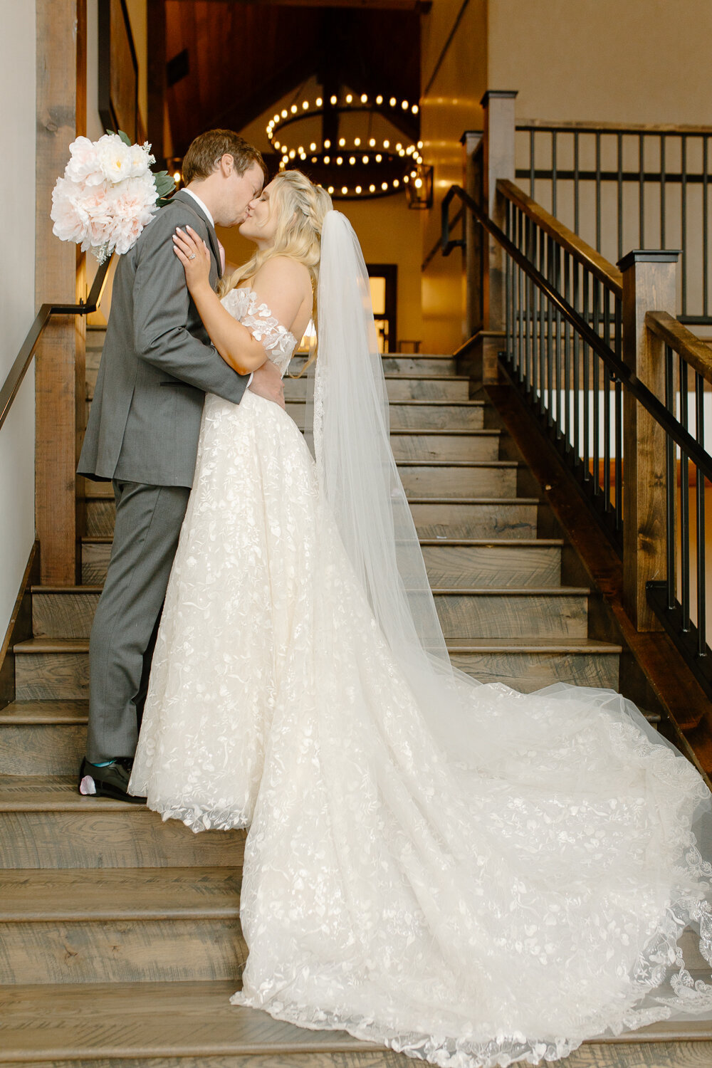 A bride and groom kiss at Black Canyon Inn.