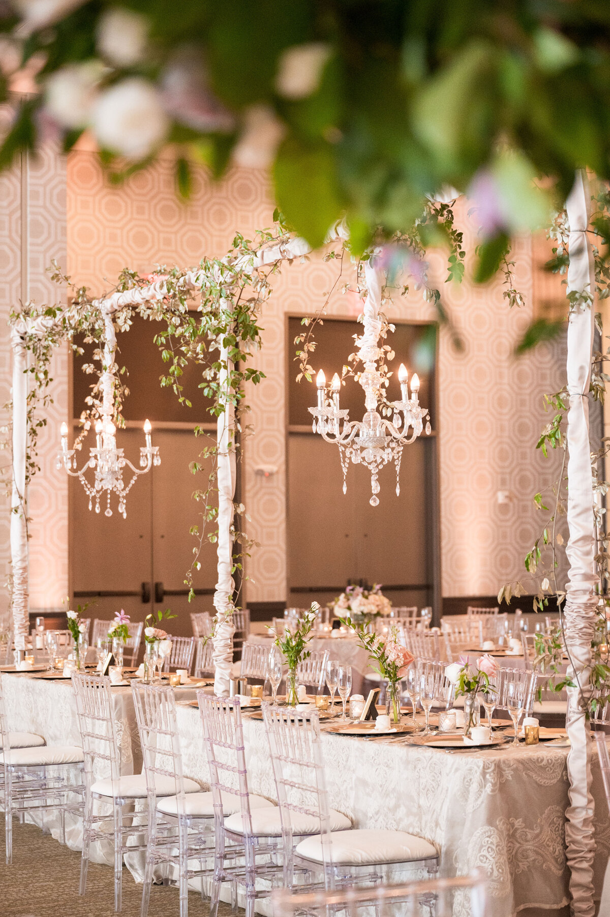 ballroom design for wedding at fairmont hotel with chandeliers and flowers