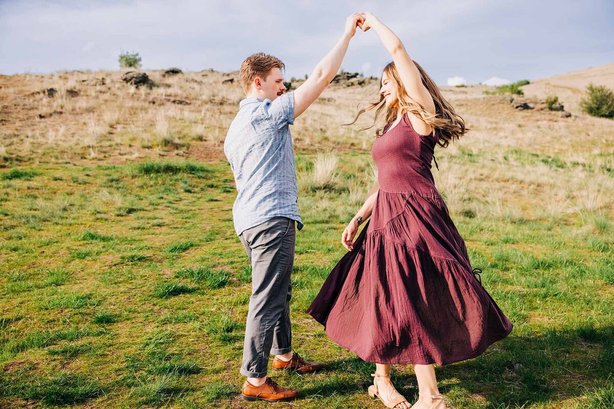 Missoula couple dancing outside on spring day