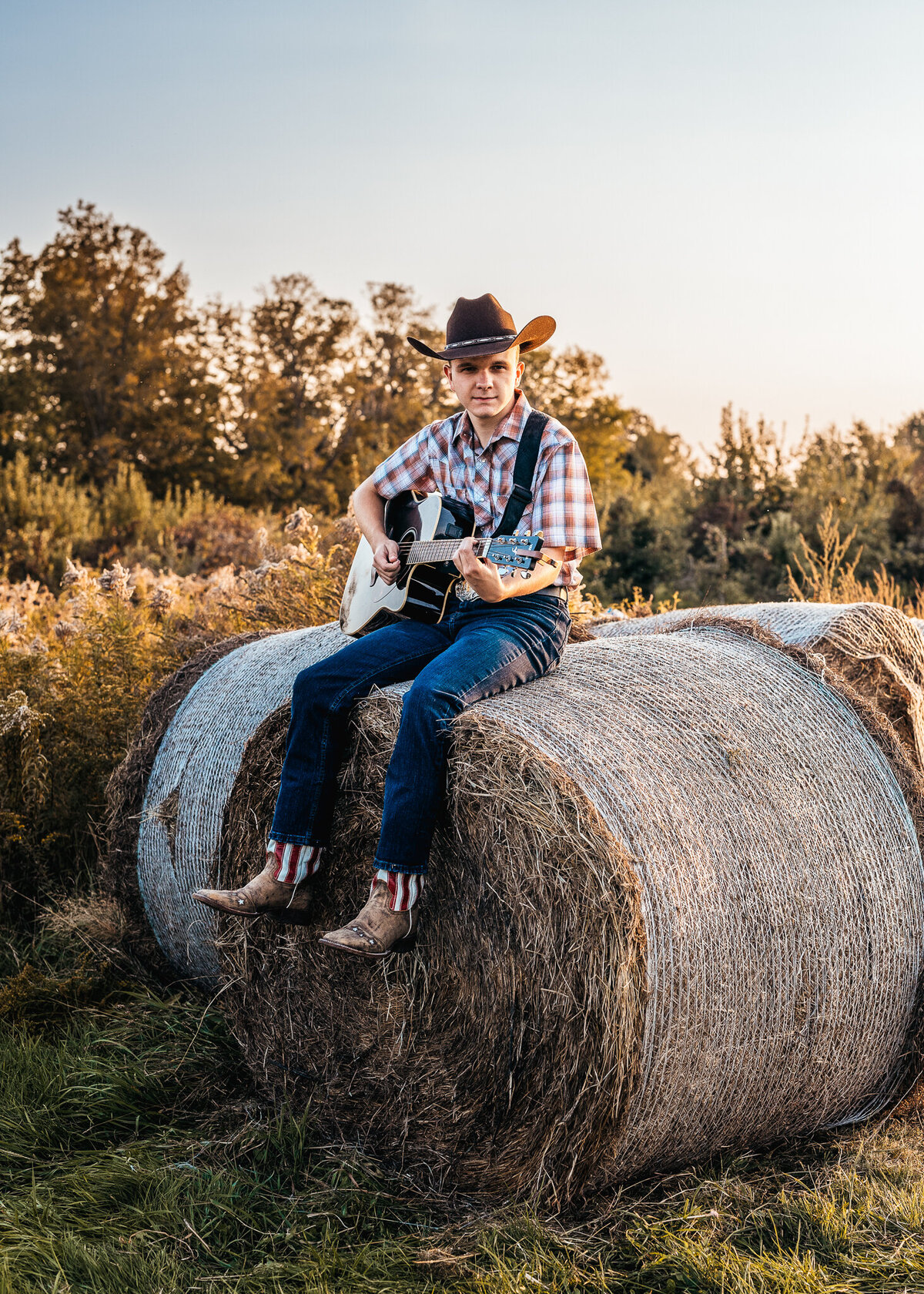 Country themed  High School Senior photo at Hackleboro Orchard in Concord NH by Lisas smith Photography