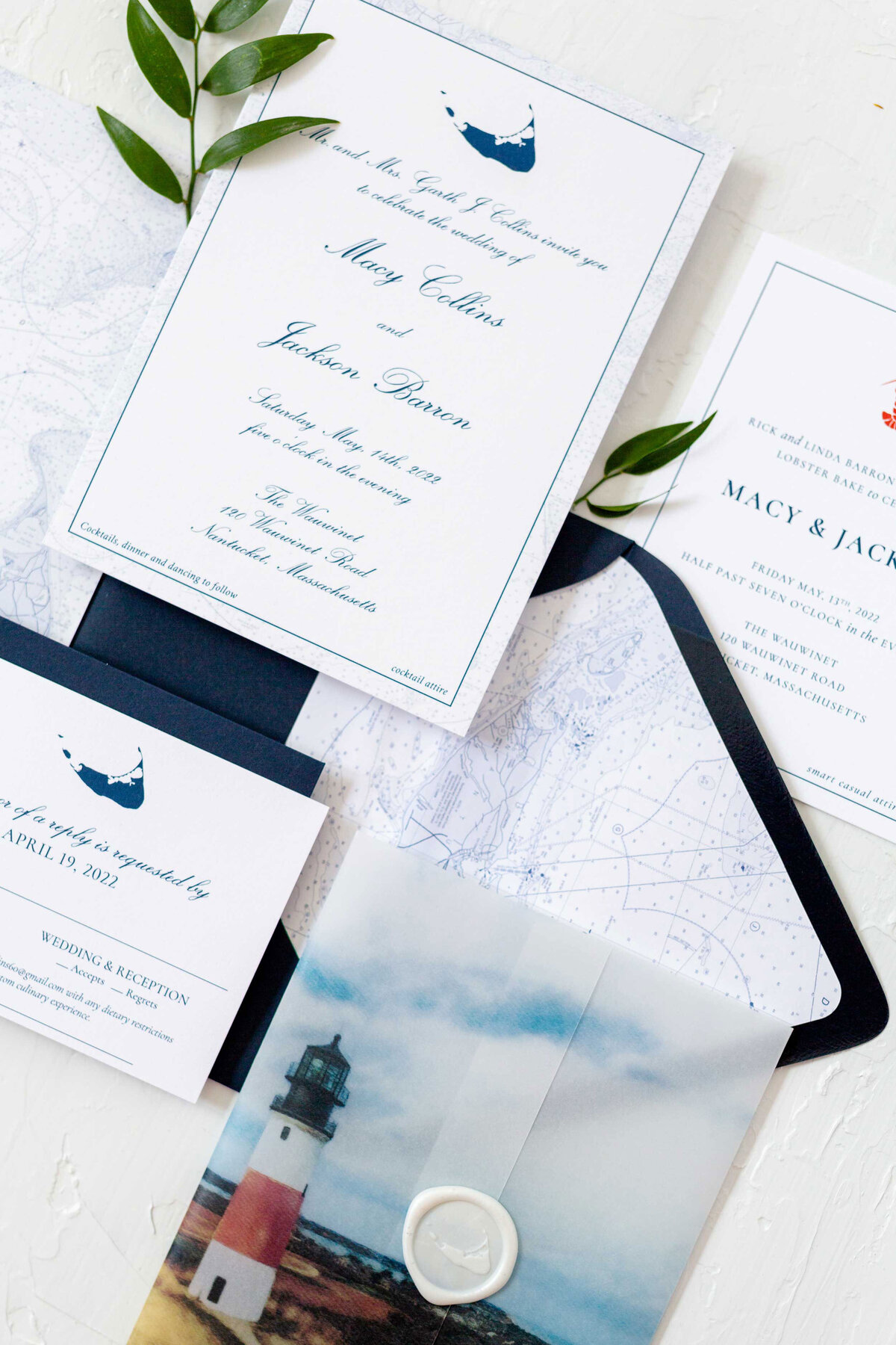 Nantucket wedding invitation with white wax seal, lighthouse vellum wrap and nautical chart on back of invitation and on envelope liner