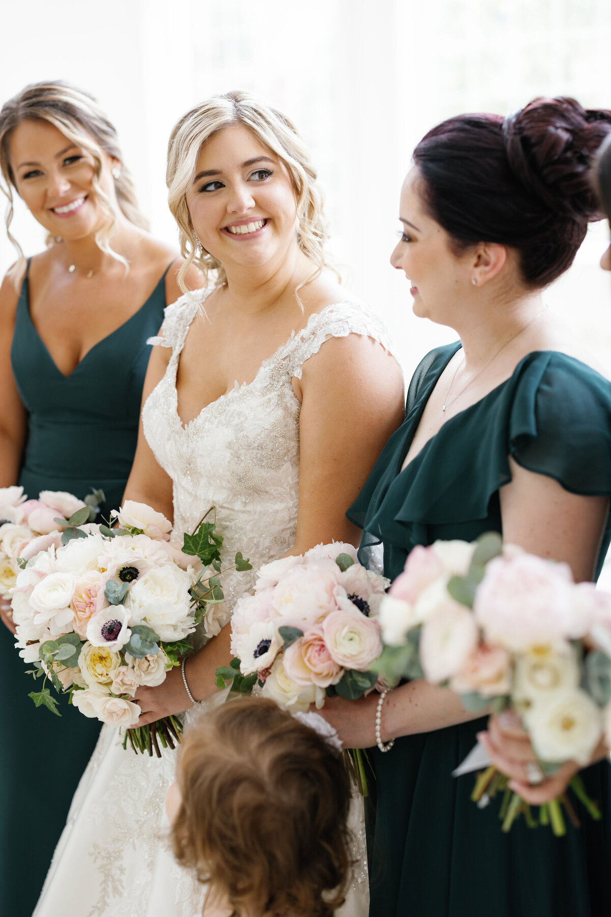 emeralnd-bridesmaids-dresses-with-blush-and-white-bouqets-enza-events