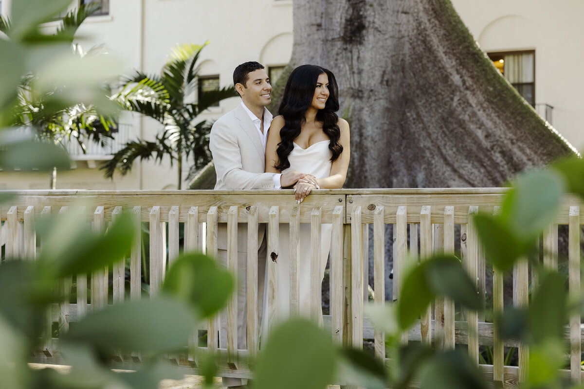 bride and groom poses for photos in south florida