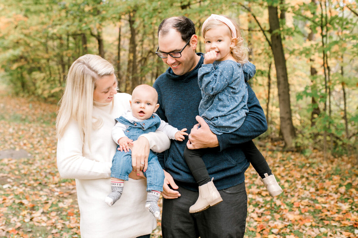 family of 4 at Balls Falls Conservation in the fall. Niagara Family Photography by Kristine Marie Photography.
